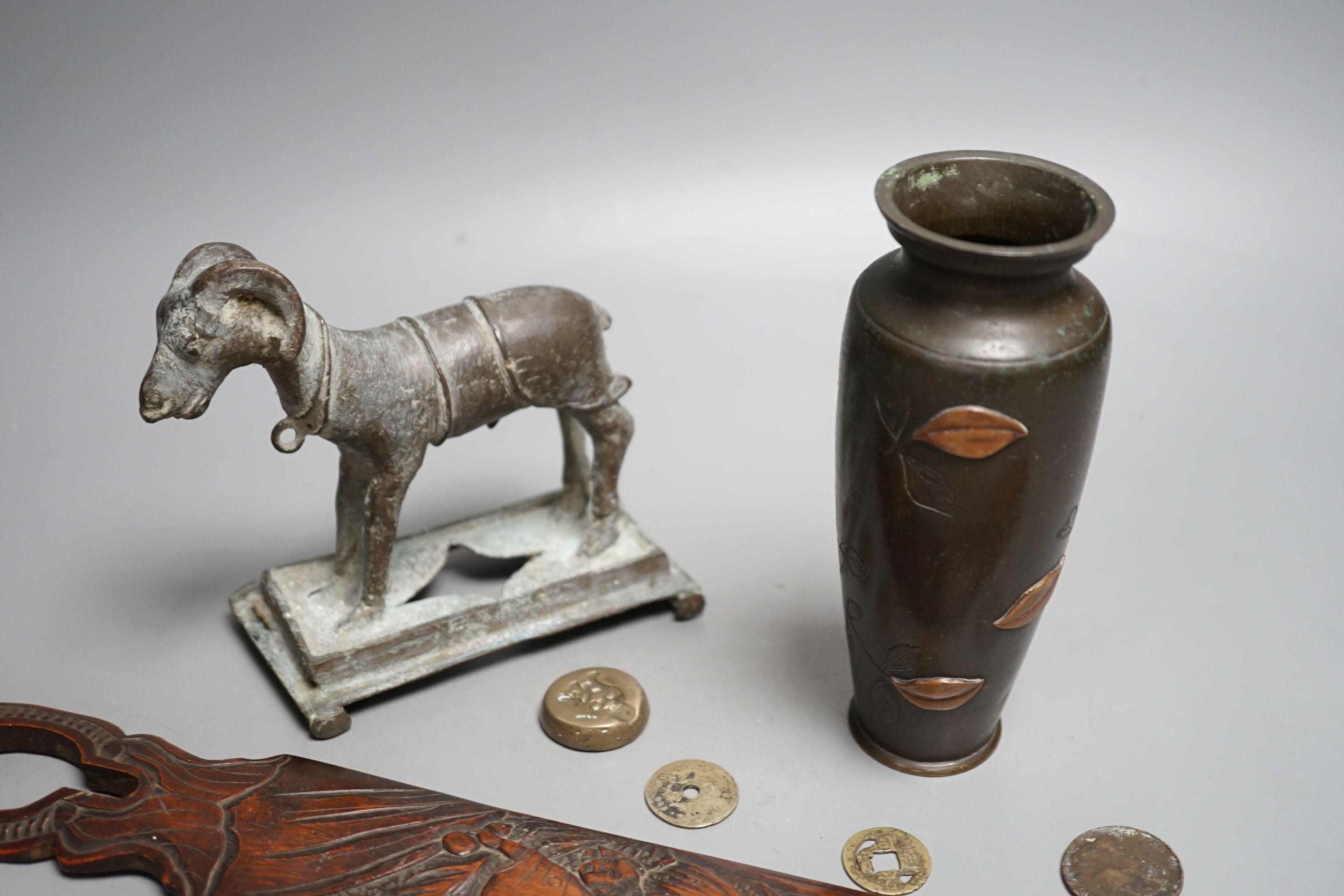 A collection of Japanese and Indian objects, largest page Turner, 46cms long.